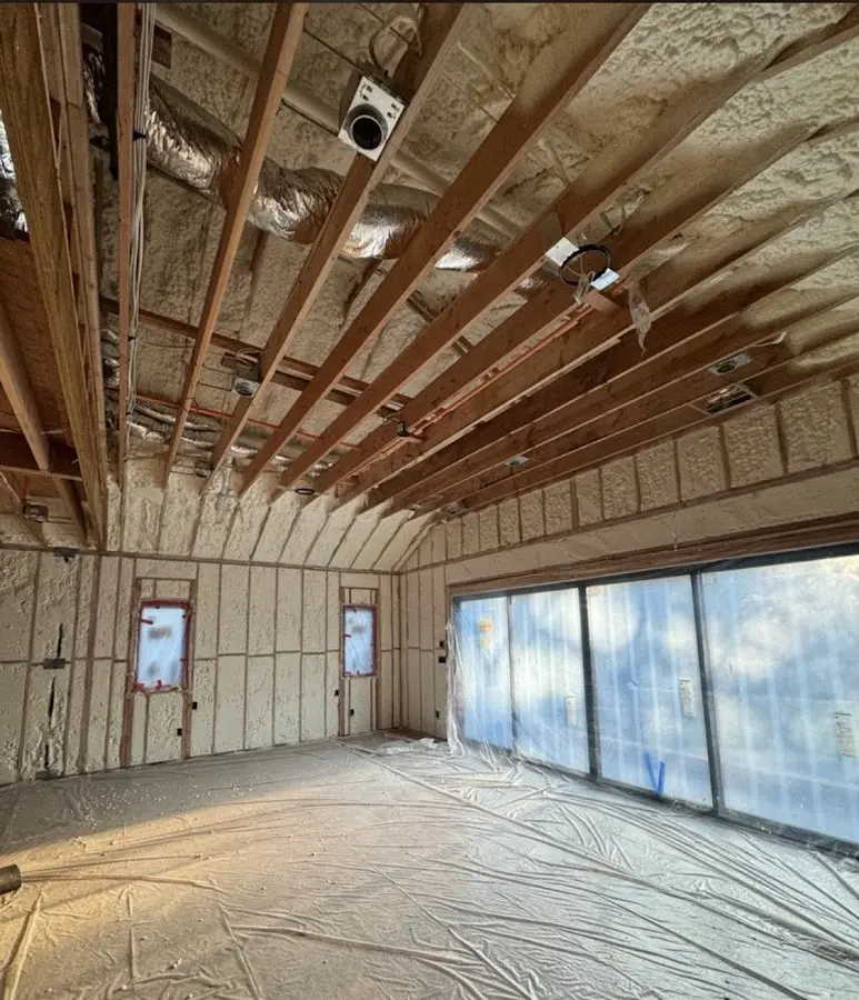 Interior walls and ceiling insulated with spray foam during new construction in Clarks Summit